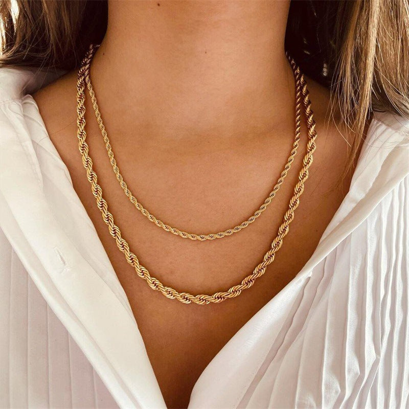 Olivia halsketting in gedraaide stijl | 18K goud