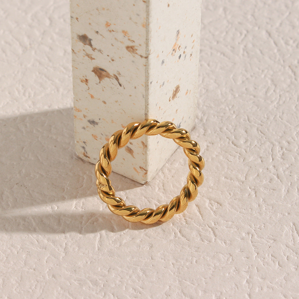 Melody Twist Ring | 18k Goud