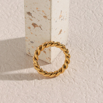Melody Twist Ring | 18k Goud