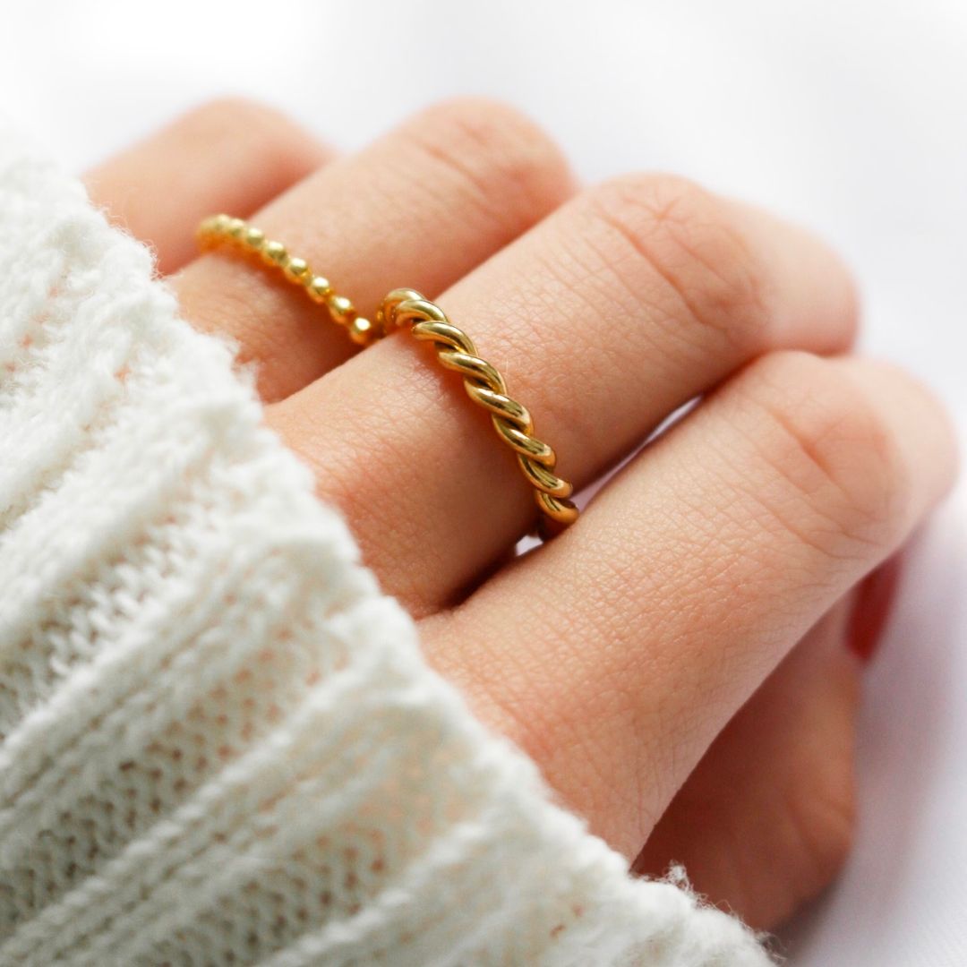 Melody Twist Ring | 18k Goud