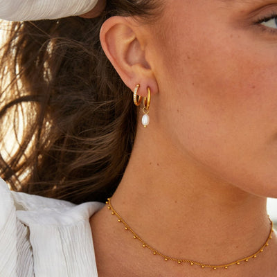 Bella oorbellen met zoetwaterparels | 18k Goud