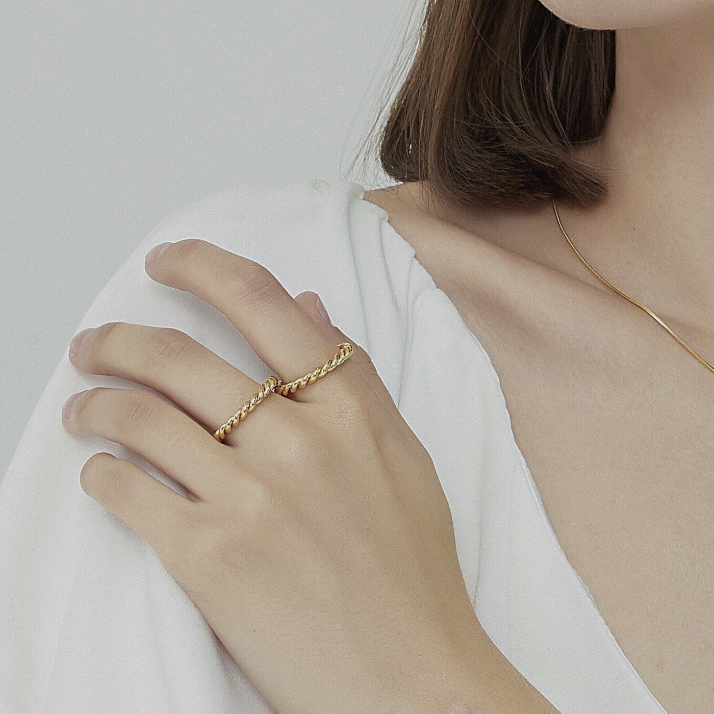 Melody Twist Ring | 18k Goud
