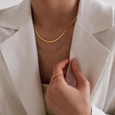 Melody Twist Ring | 18k Goud